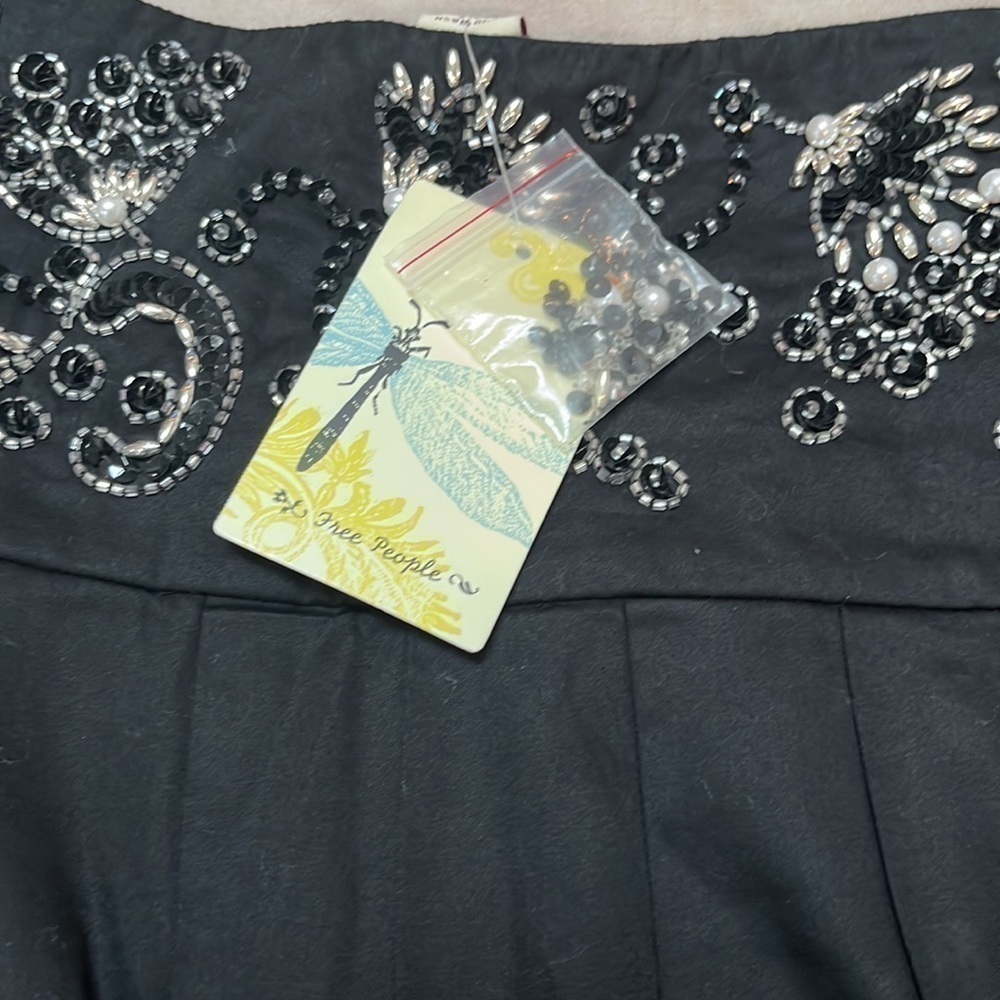 Free People black beaded, pleated skirt with bow front - Picture 5 of 7